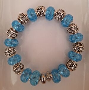 Elegant Handmade Blue Glass Beaded Bracelet. Accesorized With Silver Encased